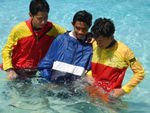 RESCUE, INITIATIVE TEST, 3
Rescuers assist an injured swimmer onto the beach 15
