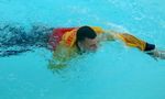 SWIM STROKES, FRONT CRAWL, 6
Reach way ahead while your other hand pushes you forward 14